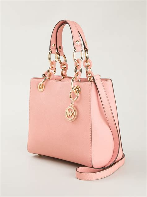 michael kors peach handbag|michael kors pink suitcase.